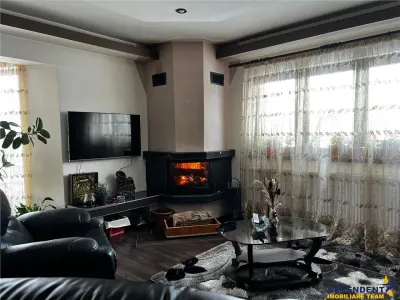 Casa ce imbina eleganta cu functionalitatea, confort pe infrastructura locala - foto 14