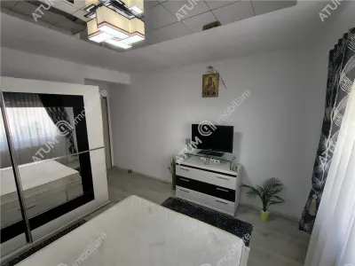 De inchiriat apartament modern la etajul 1 cu 2 camere decomandate, balcon si loc de parcare privat in Sibiu - foto 11