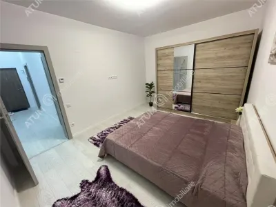 De inchiriat apartament modern cu 2 camere decomandate si balcon in zona Deventer din Sibiu - foto 4
