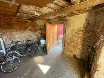 De vanzare apartament cu 2 camere si gradina situat in zona centrala a orasului Cisnadie - foto 17